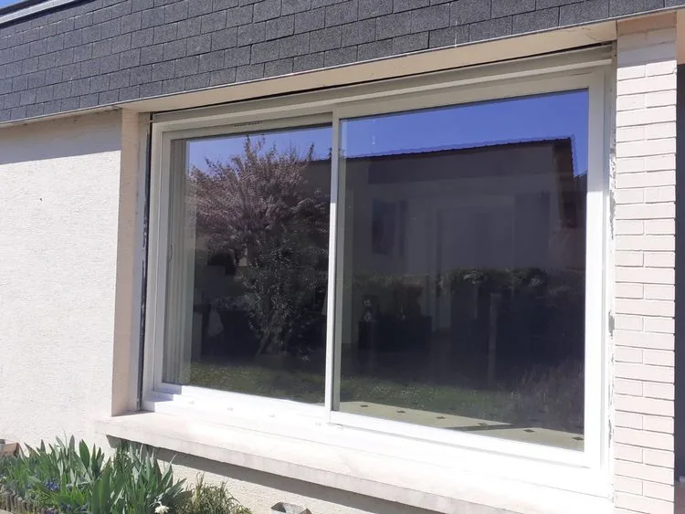 Réalisation à Franconville : Installation d’une Porte-Fenêtre et Fenêtre Coulissante en KF 310 - Marque Internorm — photo 2